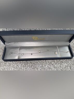 10K White Gold Multi Charm Bracelet CZ Reversible Hearts & Clover Ryan Jewellers